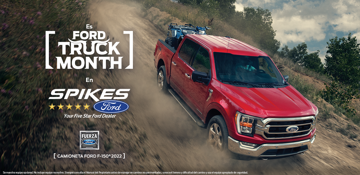 vehiculos ford parqueados en el techo de un edificio